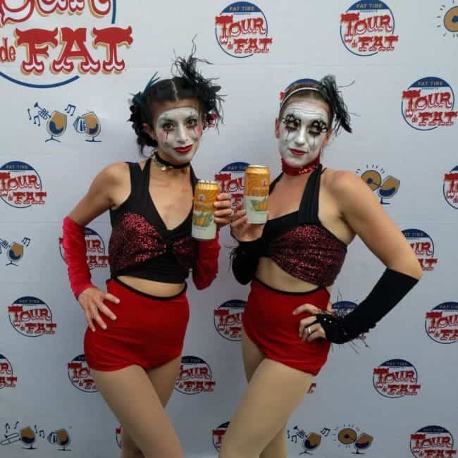 Acrobats enjoying a beer at Tour de Fat in Charlotte, NC | Kaci & Katie | Imagine Circus Performers