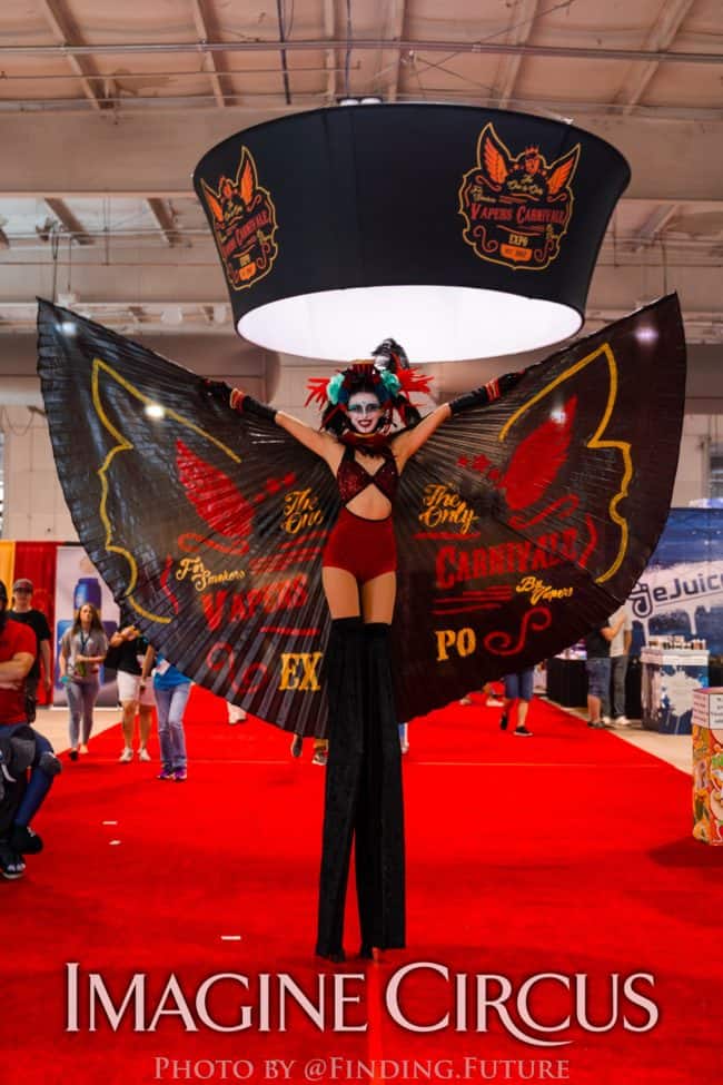 Dark Circus, Stilt Walker, Kaci, Logo Branded Wings, Vapers Carnivale, Imagine Circus Performers, Photo by Finding Future