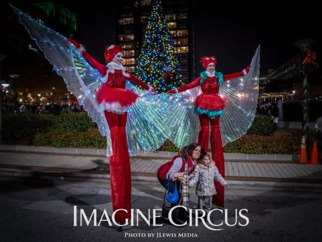 LED Isis Wing Stilt Walkers, Kaci and Liz, Winter Holiday Entertainment, Christmas Tree Lighting Greensboro, Imagine Circus, Photo by JLewis Media