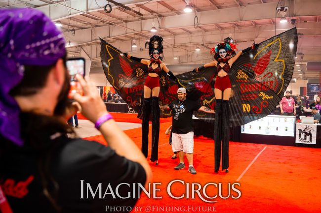 Dark Circus, Stilt Walkers, Liz and Kaci, Logo Branded Wings, Vapers Carnivale, Imagine Circus Performers, Photo by Finding Future