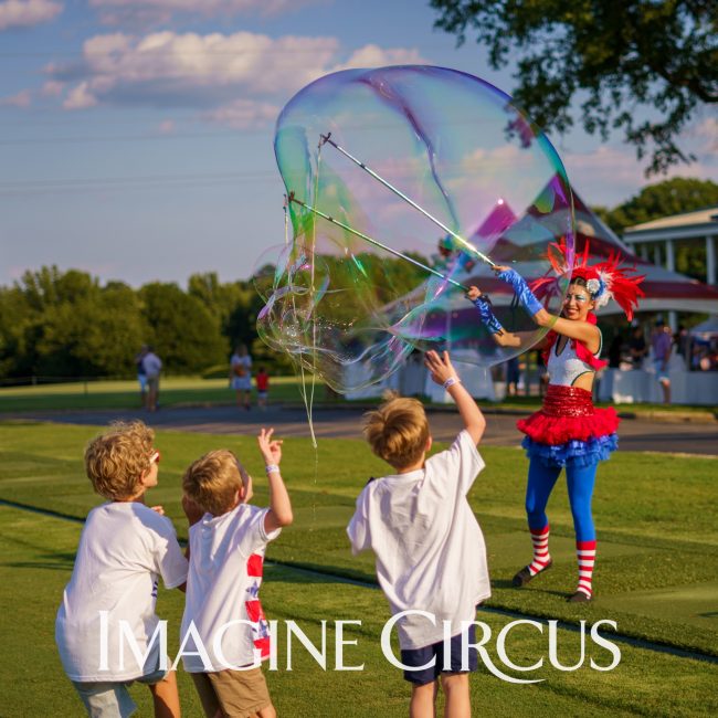 Giant Bubble Artist, Kaci, July 4 Raleigh, Imagine Circus Entertainment, photo by JLewis Media