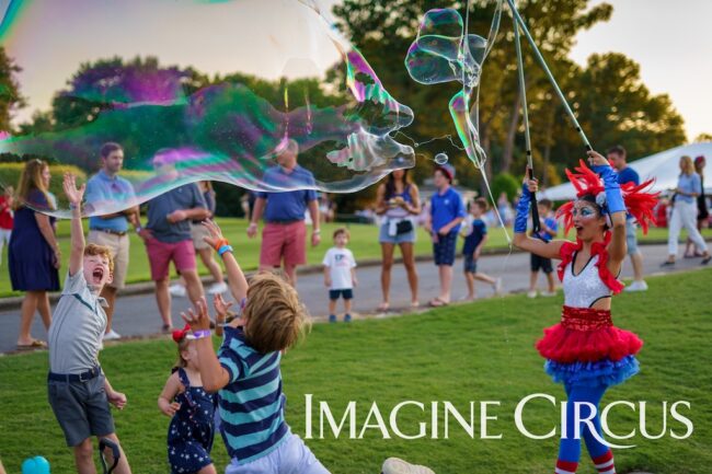 Giant Bubble Artist, Kaci, July 4 Raleigh, Imagine Circus Entertainment, photo by JLewis Media