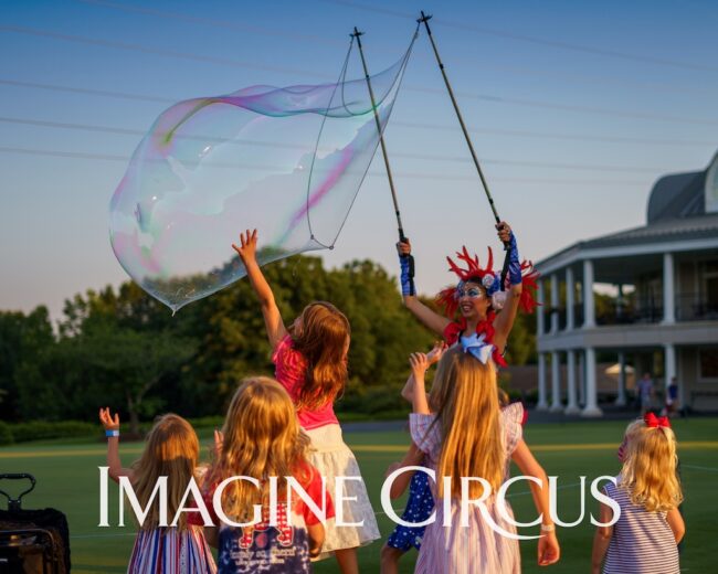 Giant Bubble Artist, Kaci, July 4 Raleigh, Imagine Circus Entertainment, photo by JLewis Media