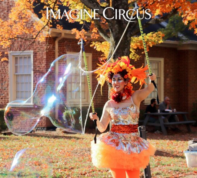 Imagine Circus Performers, Fall Festival, Autumn, Bubble Artist, Stilt Walker, Hooper, Orange, Brown, Gold, Photo Credit: Chapel Hill Community Arts & Culture
